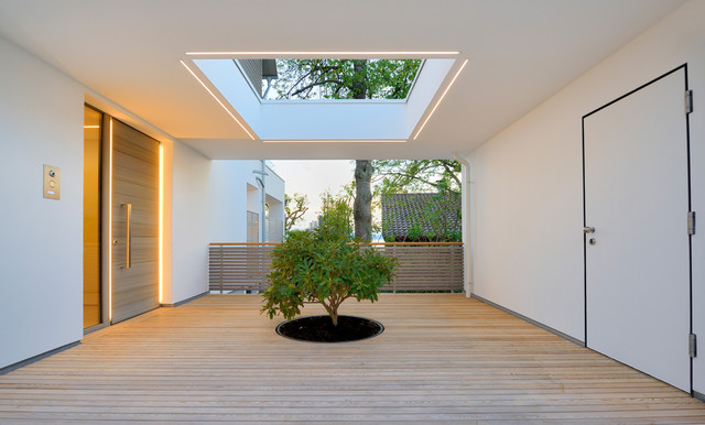 Haus am See contemporaneo-ingresso