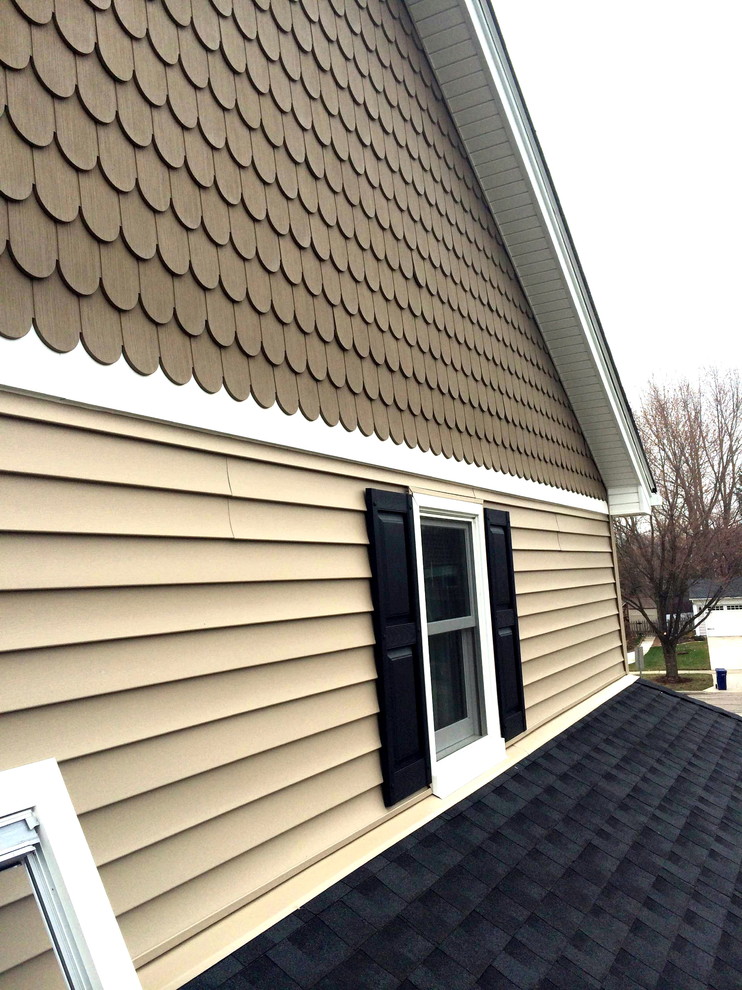 Scalloped Siding and Complete Exterior Renovation Traditional