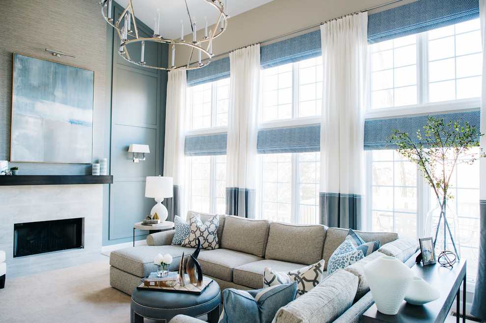 Inspiration for a coastal beige floor living room remodel in Detroit with beige walls and a standard fireplace