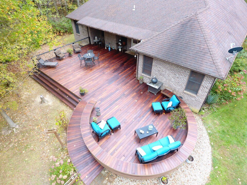 This is an example of a large contemporary backyard deck in Cincinnati.