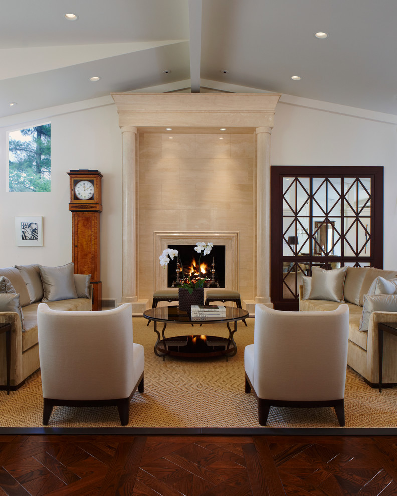 Photo of a contemporary living room in Detroit with a tile fireplace surround and white walls.
