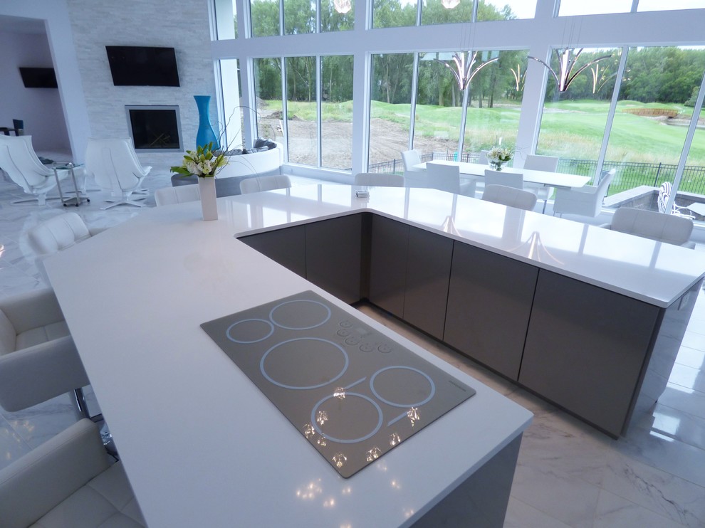 Design ideas for an expansive contemporary u-shaped eat-in kitchen in Other with an undermount sink, flat-panel cabinets, grey cabinets, quartz benchtops, blue splashback, glass tile splashback, stainless steel appliances, marble floors and with island.
