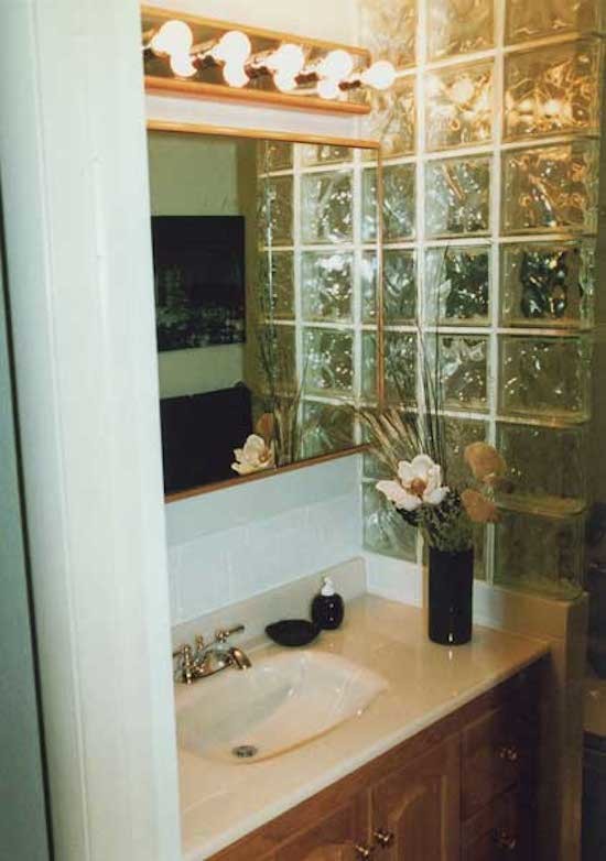 Bathroom - transitional white tile bathroom idea in Denver with white walls and medium tone wood cabinets