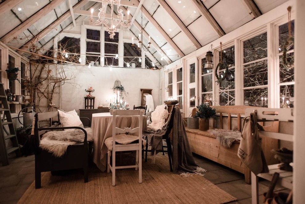Design ideas for a country sunroom in Stockholm with concrete floors and a standard ceiling.
