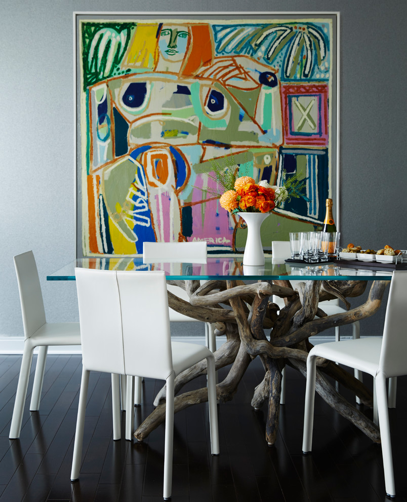 This is an example of a contemporary dining room in Toronto with grey walls.