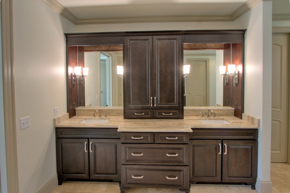 Inspiration for an expansive master bathroom in Atlanta with an undermount sink, raised-panel cabinets, dark wood cabinets, an undermount tub, a double shower, beige tile, stone tile, beige walls and travertine floors.