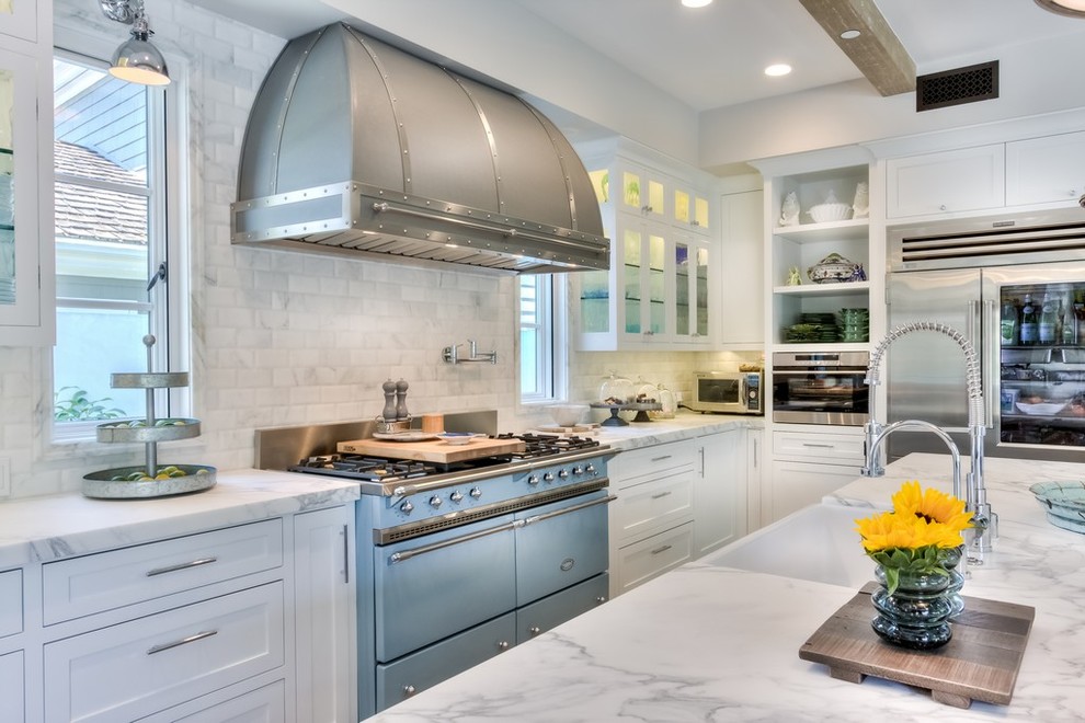 Design ideas for a large country kitchen in Orange County with a farmhouse sink, shaker cabinets, white cabinets, marble benchtops, grey splashback, subway tile splashback and stainless steel appliances.