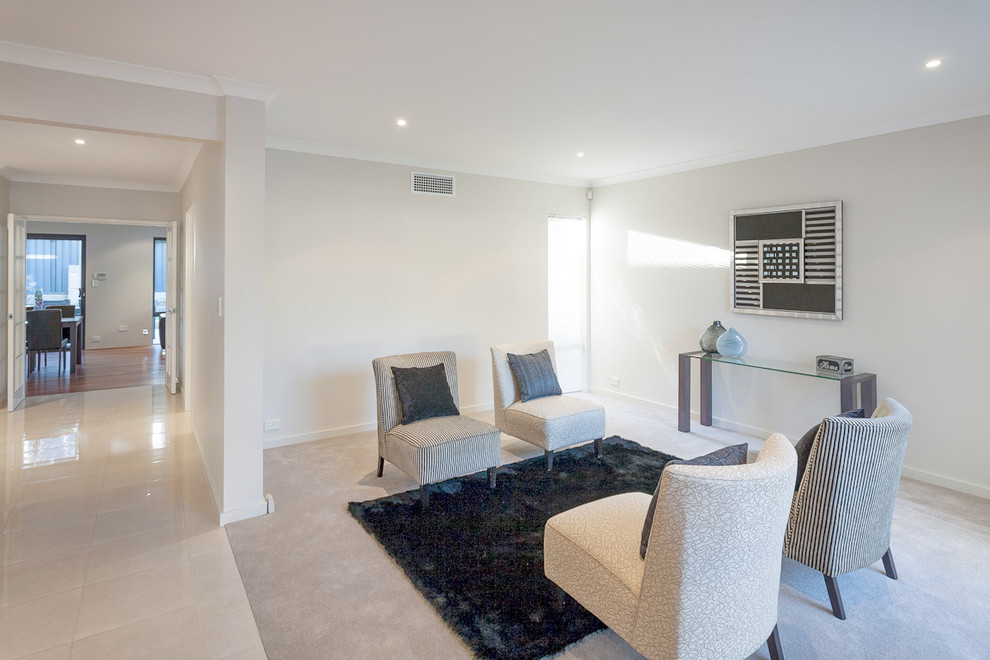 This is an example of a modern family room in Perth.