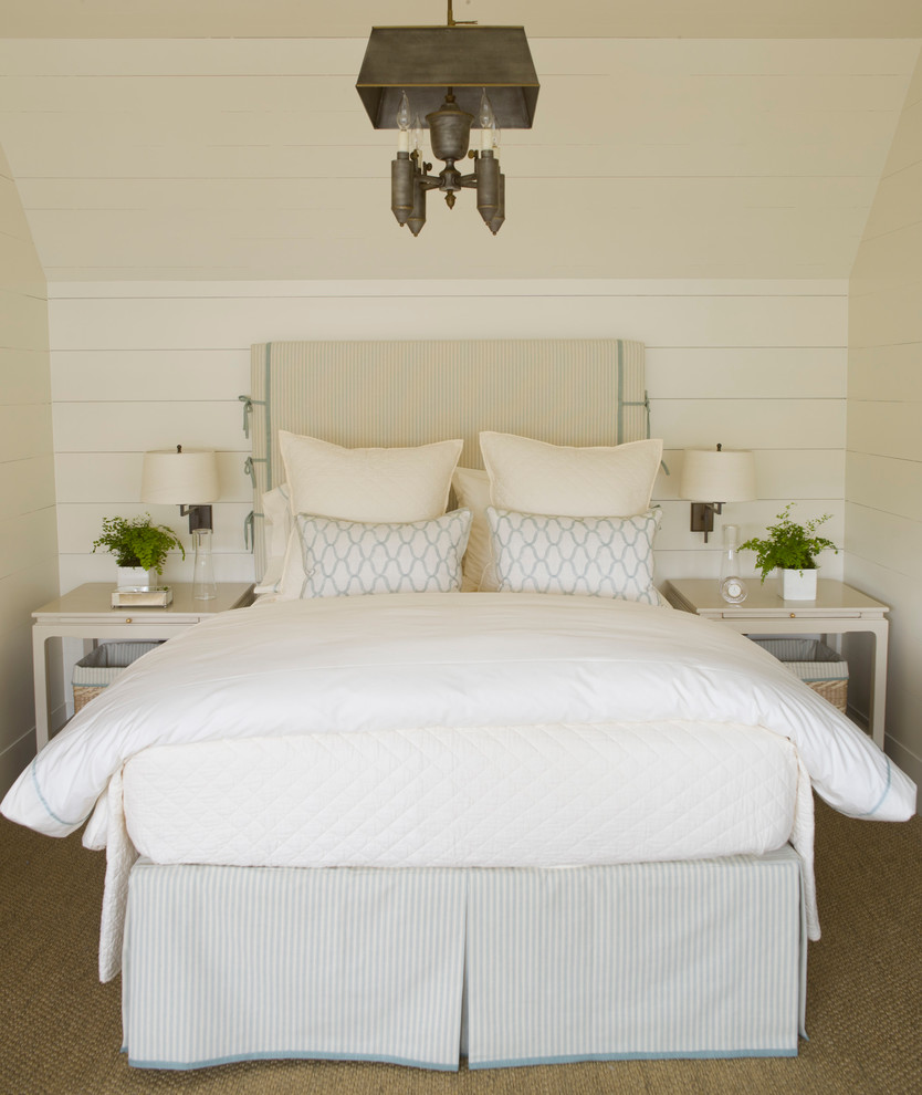 Design ideas for a large traditional guest bedroom in Charlotte with white walls and carpet.