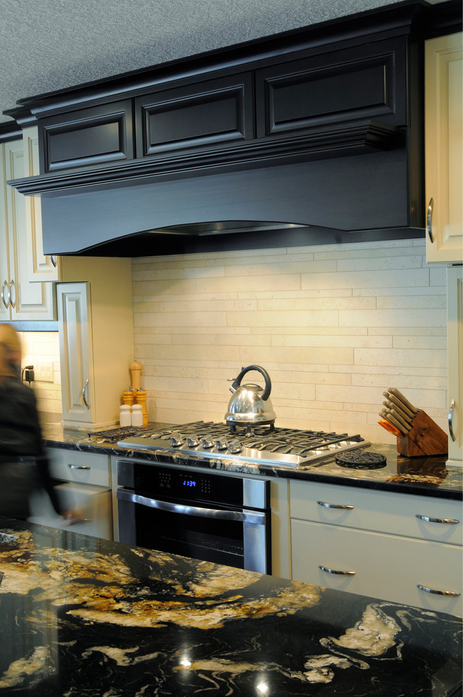 Example of a mountain style kitchen design in Calgary