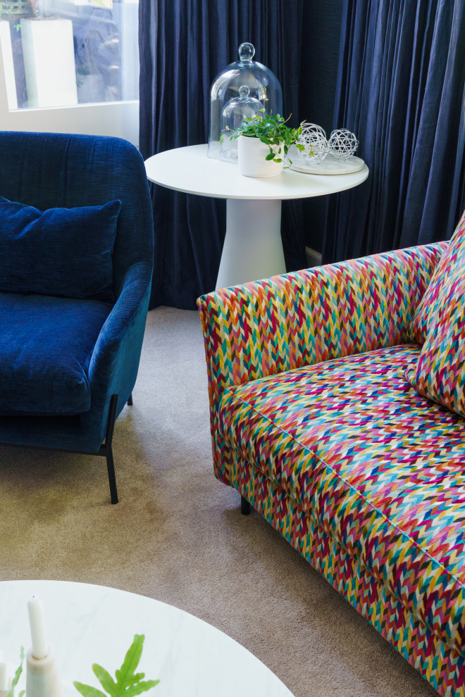 This is an example of a contemporary living room in Auckland.