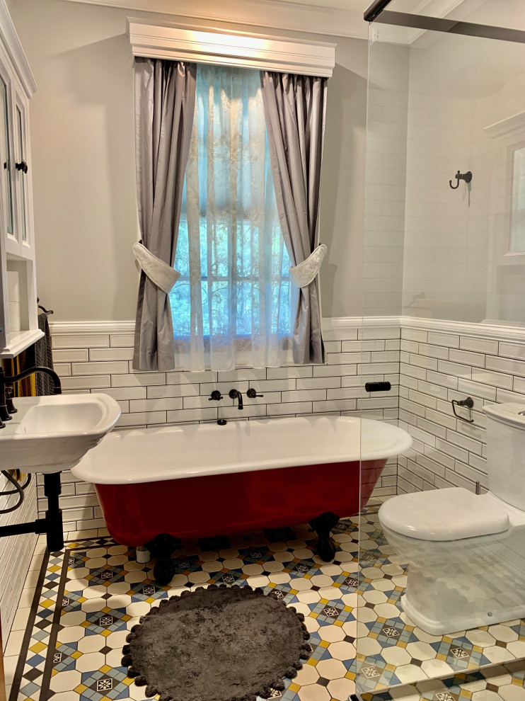 Small country kids bathroom in Brisbane with flat-panel cabinets, a claw-foot tub, a corner shower, a two-piece toilet, white tile, ceramic tile, grey walls, mosaic tile floors, a wall-mount sink, white floor, a hinged shower door, a single vanity, a floating vanity and timber.