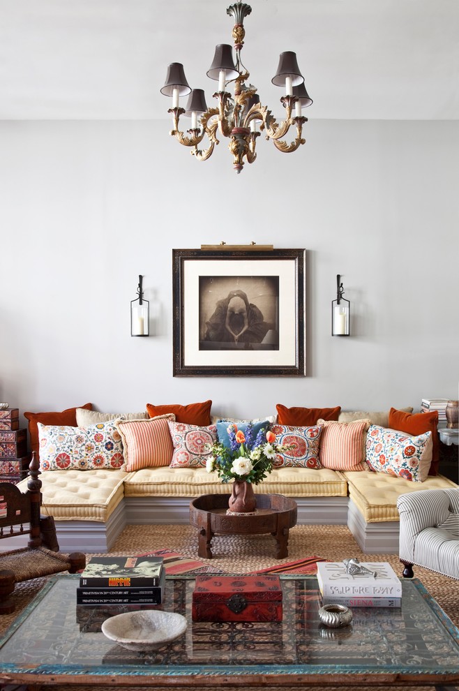 Photo of an eclectic living room in New York with white walls.