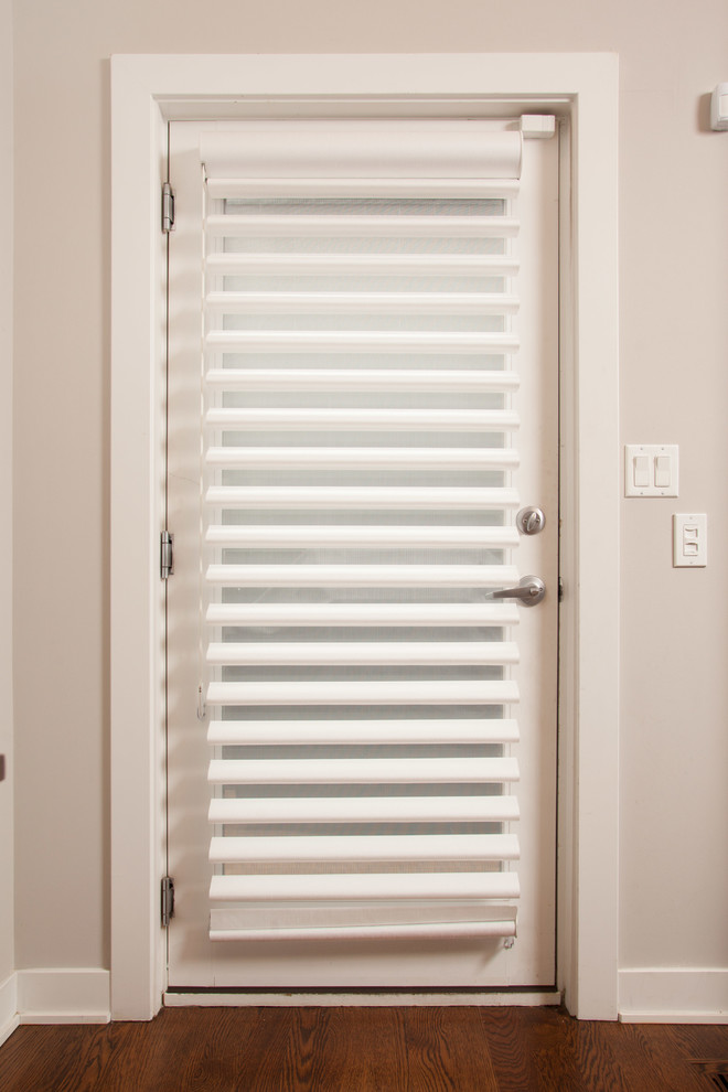 Inspiration for a mid-sized transitional dark wood floor enclosed dining room remodel in Chicago with beige walls and no fireplace
