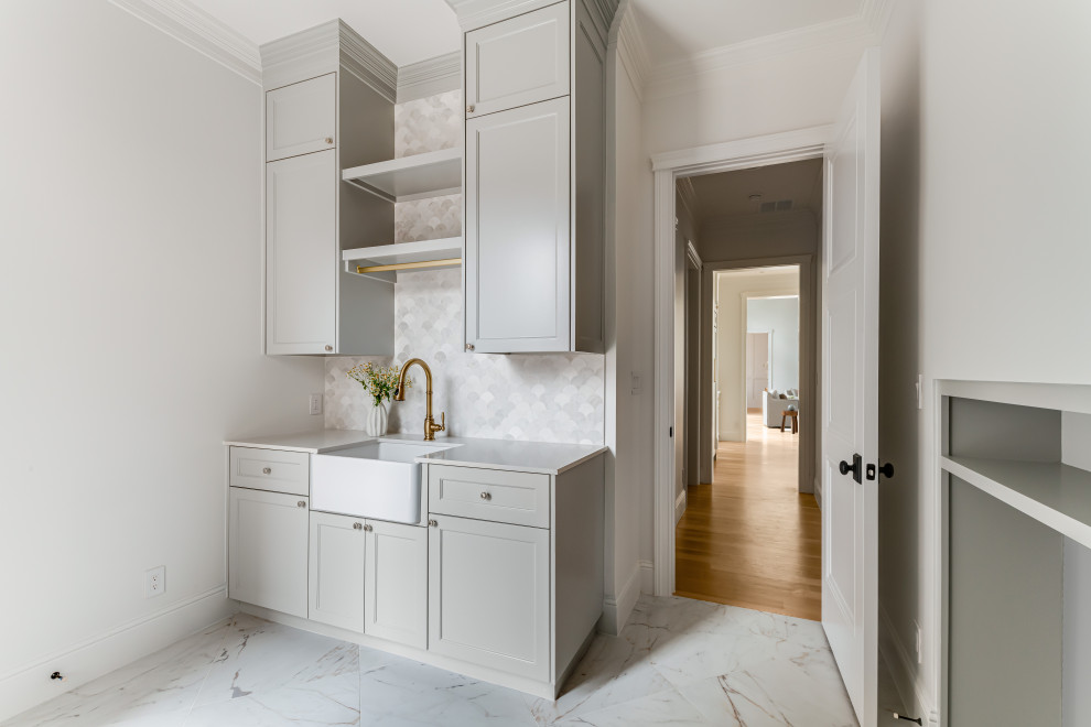 Transitional laundry room photo in Dallas