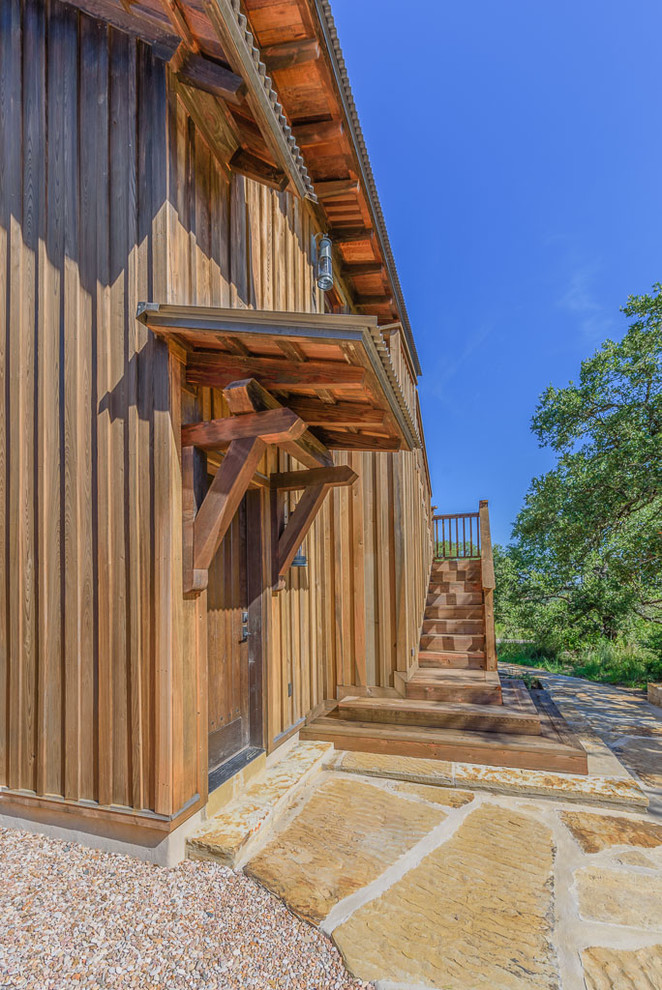 Example of a mountain style home design design in Austin