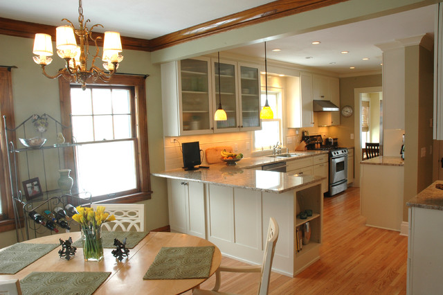 an open kitchen-dining room design in a traditional home