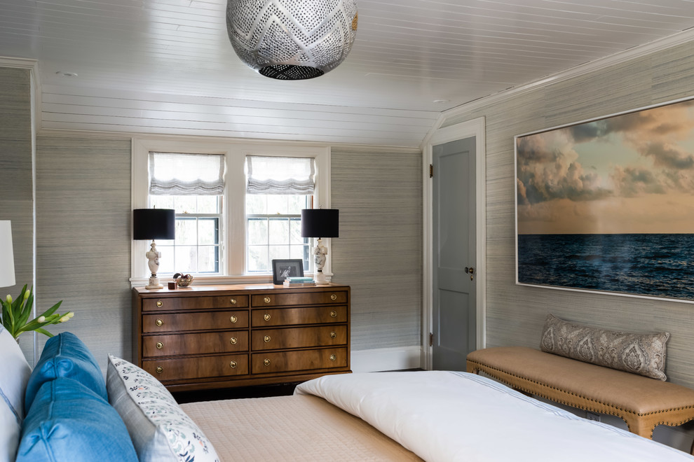 Inspiration for a mid-sized transitional master bedroom in Boston with blue walls, dark hardwood floors and brown floor.