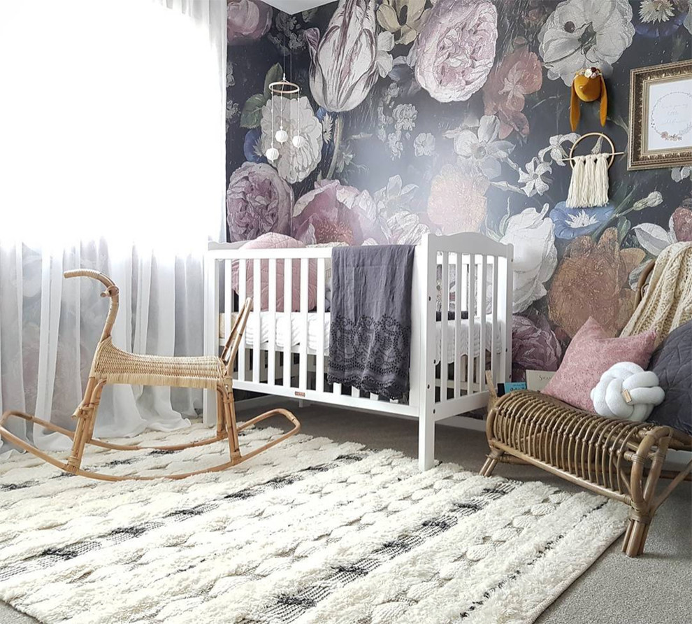 Country nursery in Sydney with multi-coloured walls, carpet and grey floor for girls.