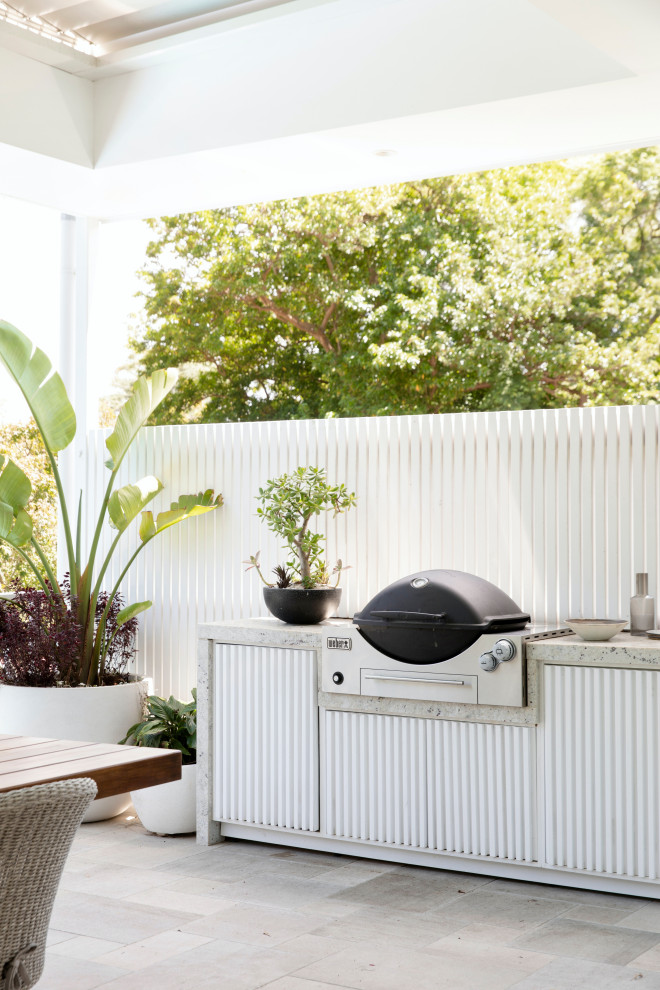 Design ideas for a beach style patio in Sydney.