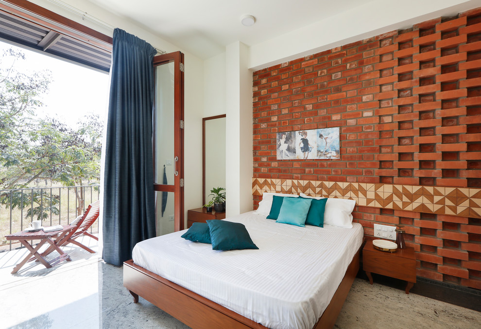 Design ideas for a contemporary bedroom in Bengaluru With White Walls.