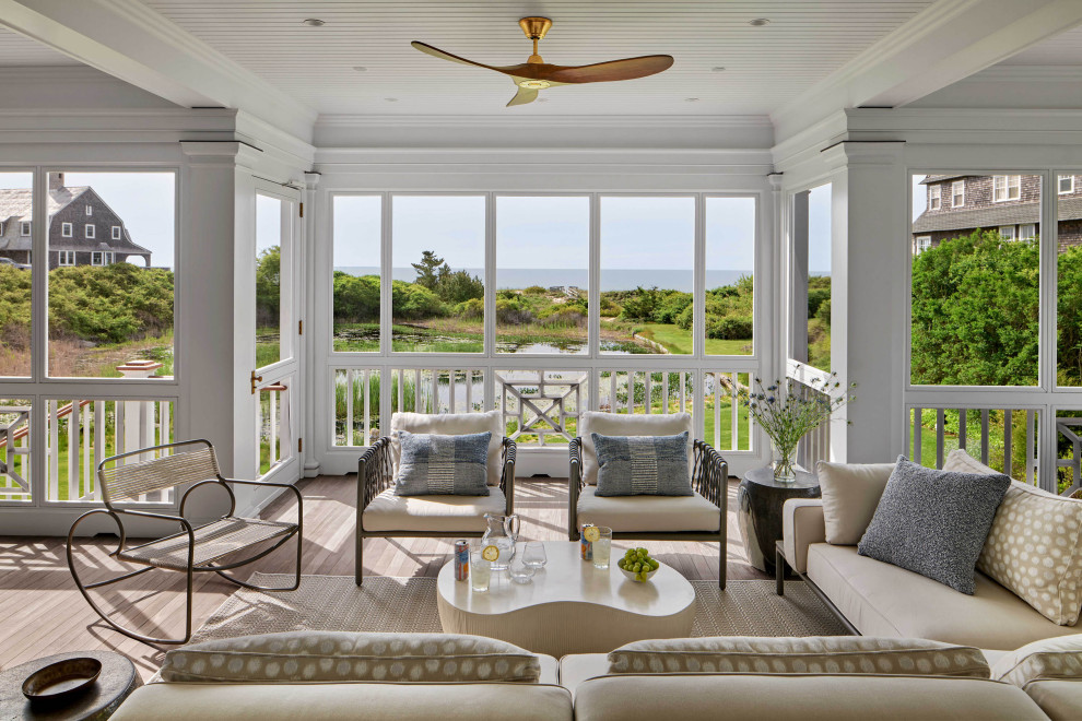 Example of a beach style light wood floor sunroom design in Providence with a standard ceiling