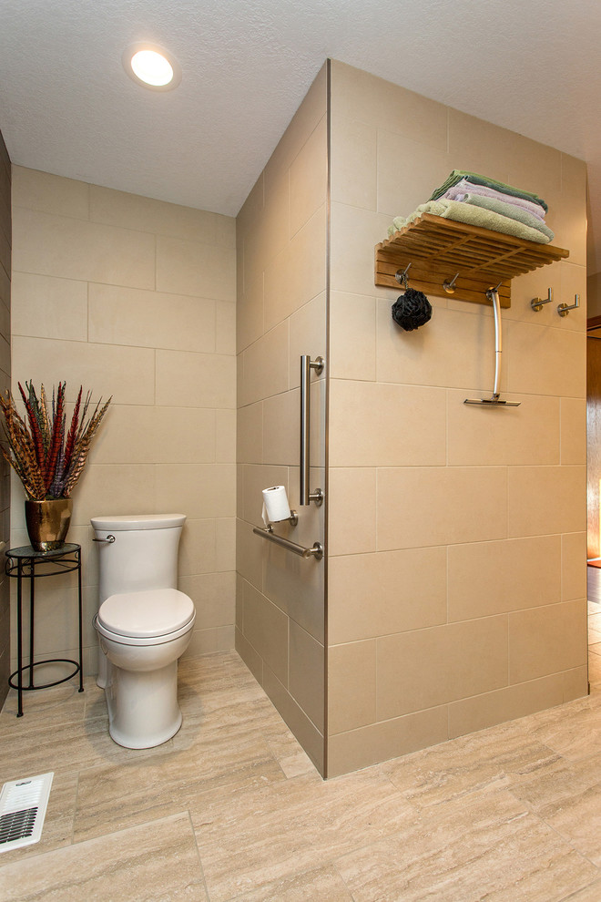 Inspiration for a mid-sized transitional master doorless shower remodel with an undermount sink, flat-panel cabinets, dark wood cabinets and beige walls