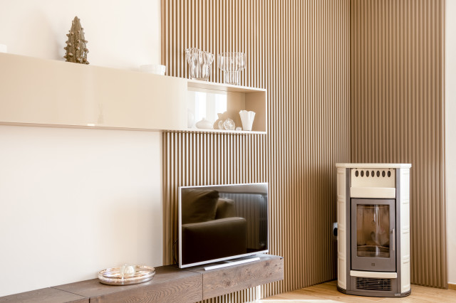 Interior Design - particolare boiserie e stufa moderne-dagligstue