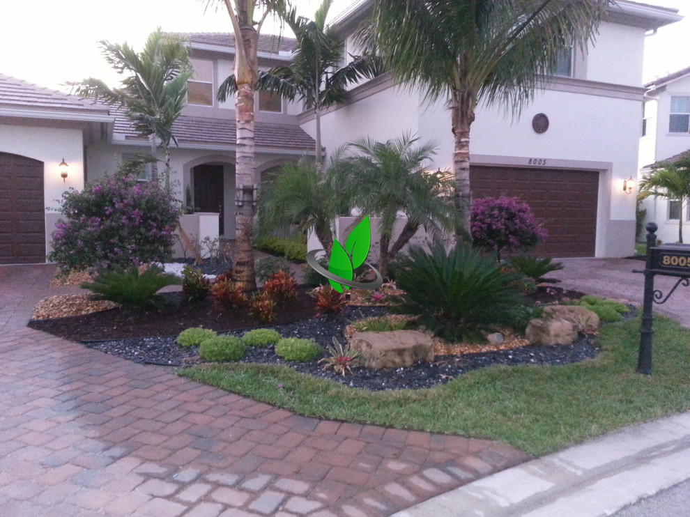 Photo of a front yard gravel landscaping.