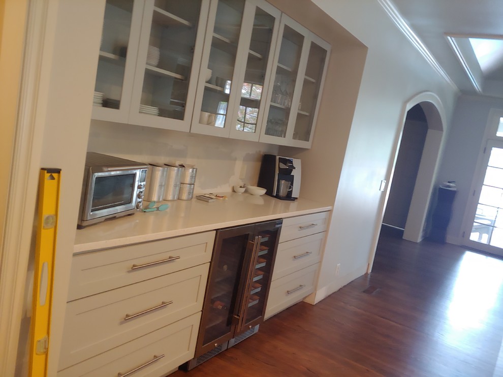 Eat-in kitchen - large transitional single-wall light wood floor eat-in kitchen idea with a single-bowl sink, shaker cabinets, gray cabinets, quartzite countertops, stainless steel appliances, an island and white countertops