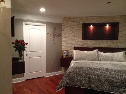 Example of a minimalist bedroom design in Cleveland