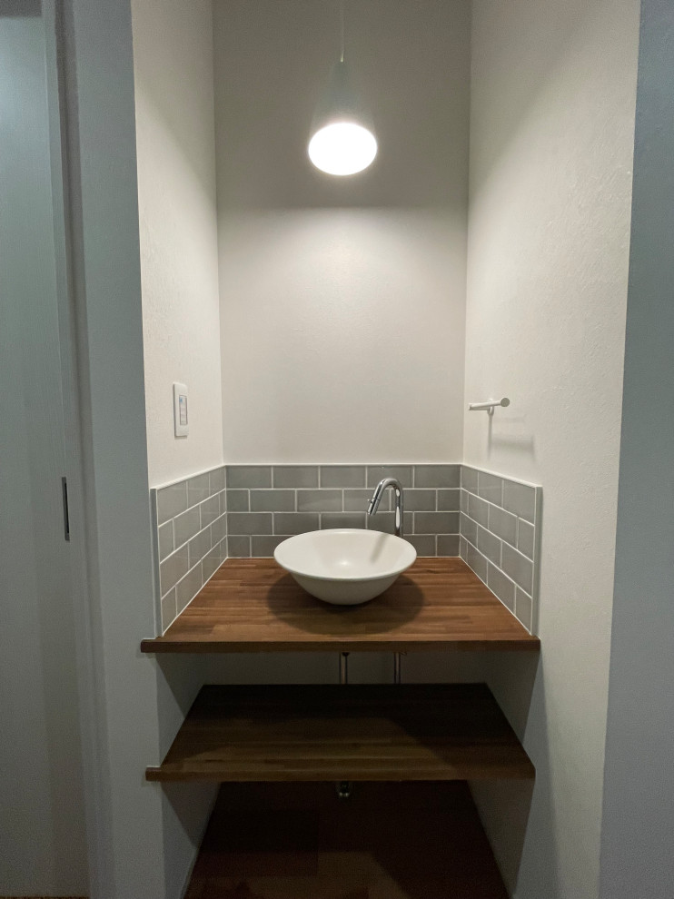 Design ideas for a scandinavian powder room in Other.