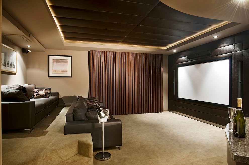 This is an example of a transitional home theatre in Perth with beige floor.