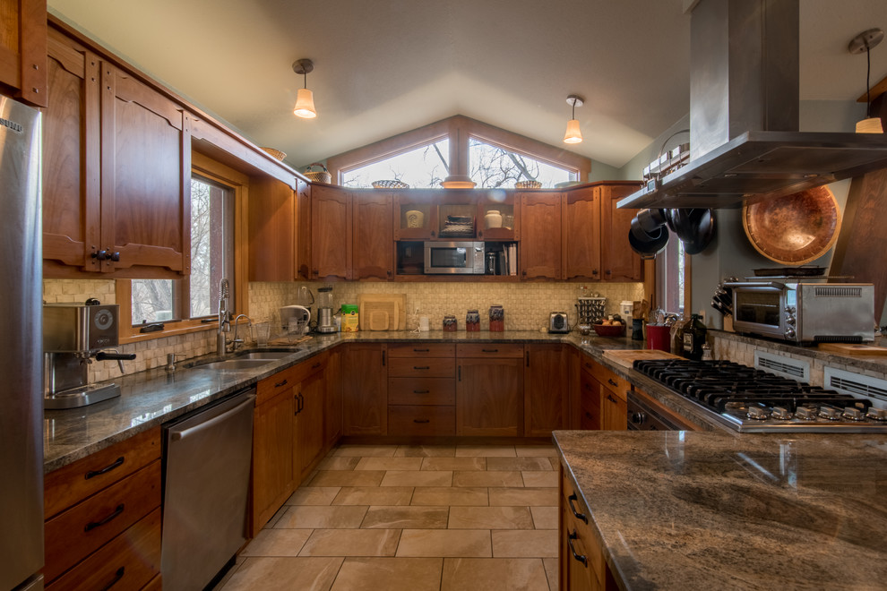 Mid-sized mountain style u-shaped kitchen photo in Denver with an undermount sink, recessed-panel cabinets, medium tone wood cabinets and stainless steel appliances