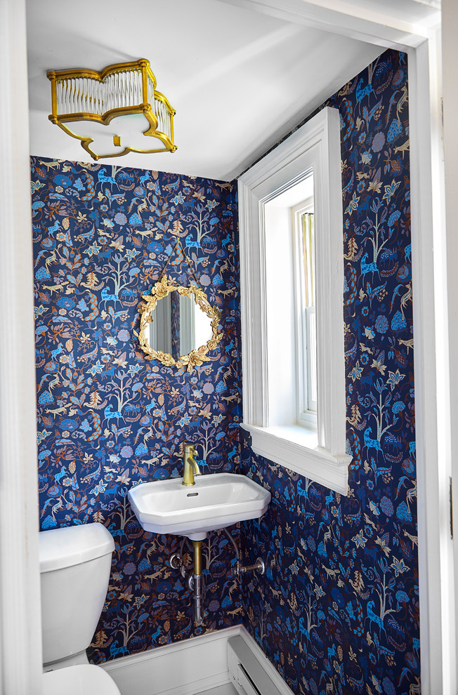 Inspiration for a small transitional powder room in Wilmington with a one-piece toilet, blue walls, marble floors, a wall-mount sink, yellow floor and white benchtops.