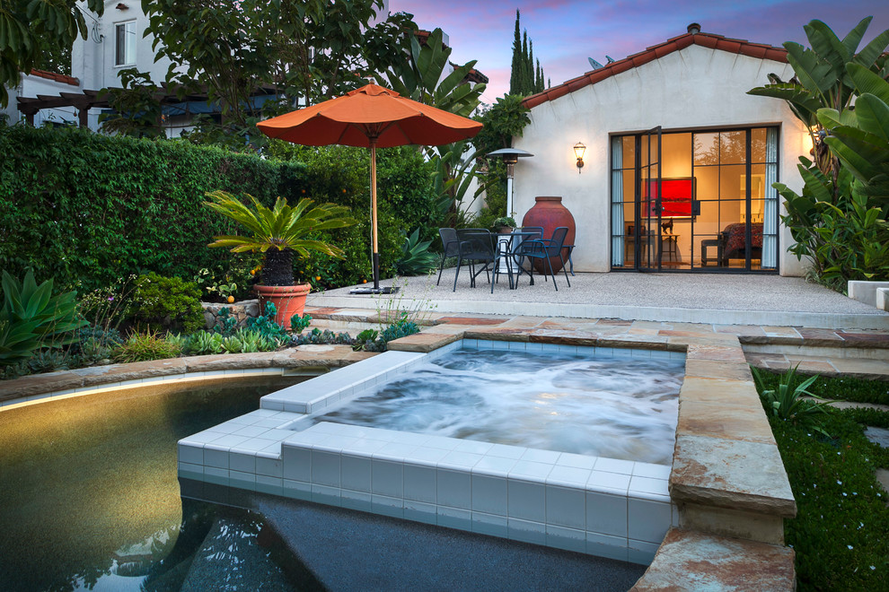 This is an example of a mediterranean pool in Santa Barbara with a hot tub.