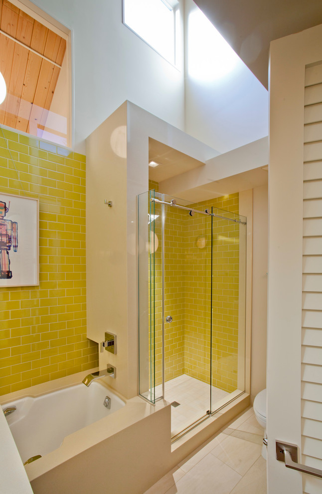 Photo of a midcentury bathroom in Portland with an alcove shower, yellow tile and subway tile.
