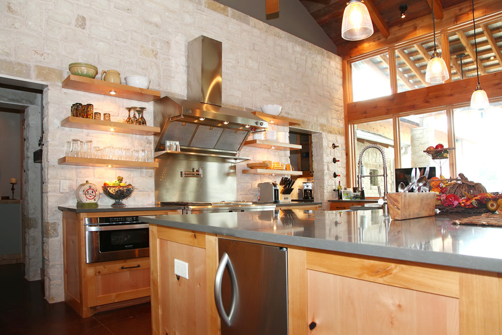 Example of a mountain style kitchen design in Dallas