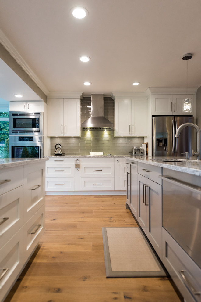 Example of a transitional kitchen design in Vancouver