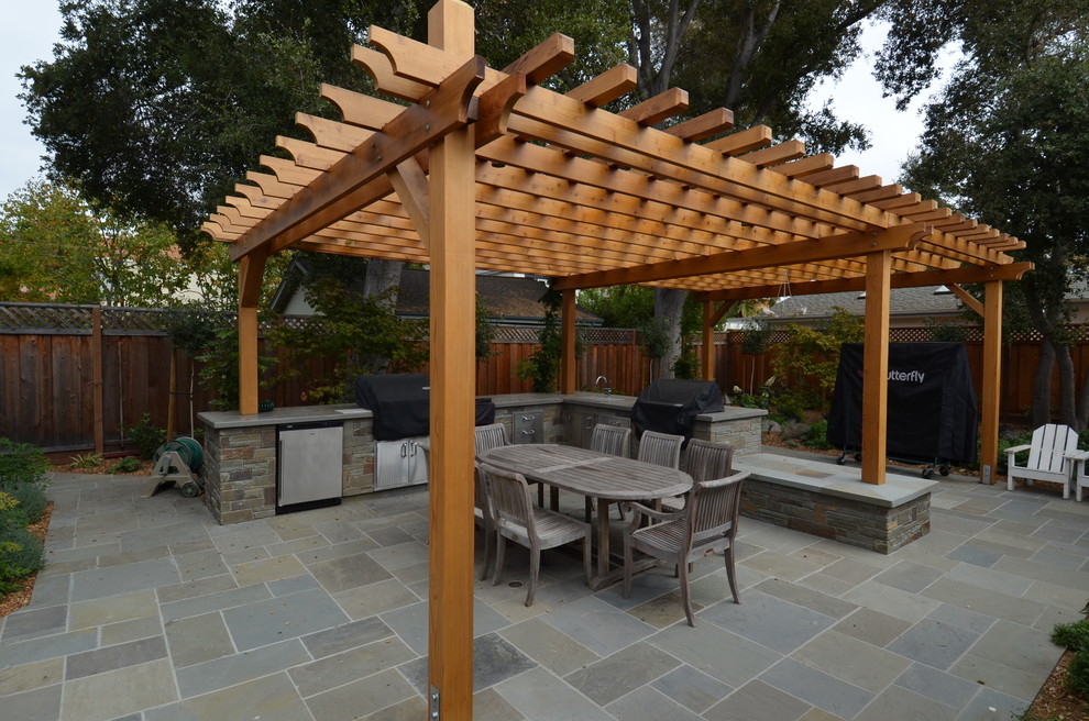 Design ideas for a mid-sized traditional backyard patio in San Francisco with an outdoor kitchen, tile and a pergola.