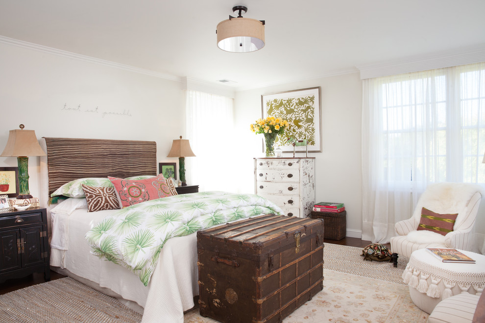 Mid-sized traditional guest bedroom in San Francisco with green walls, medium hardwood floors and brown floor.