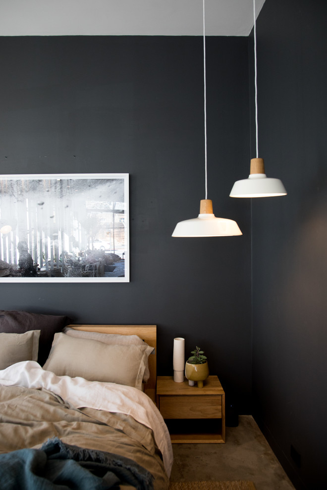 This is an example of a contemporary bedroom in Sydney.