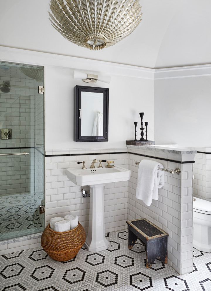 Bathroom - transitional white tile and subway tile mosaic tile floor, multicolored floor, single-sink and vaulted ceiling bathroom idea in St Louis with white walls and a pedestal sink