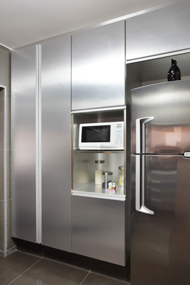 Kitchen - small modern ceramic tile kitchen idea