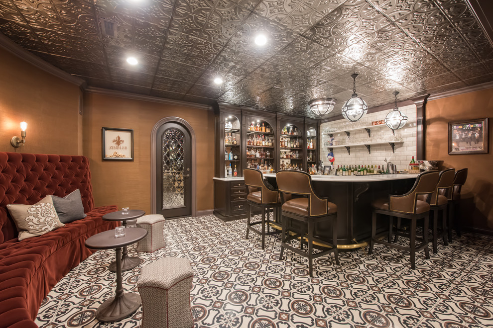 Traditional u-shaped seated home bar in Chicago with a drop-in sink, open cabinets, dark wood cabinets, white splashback, ceramic splashback, ceramic floors and multi-coloured floor.