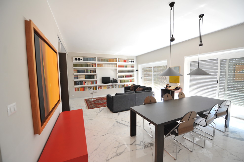 Photo of a large contemporary open concept living room in Rome with a library, grey walls, marble floors and white floor.