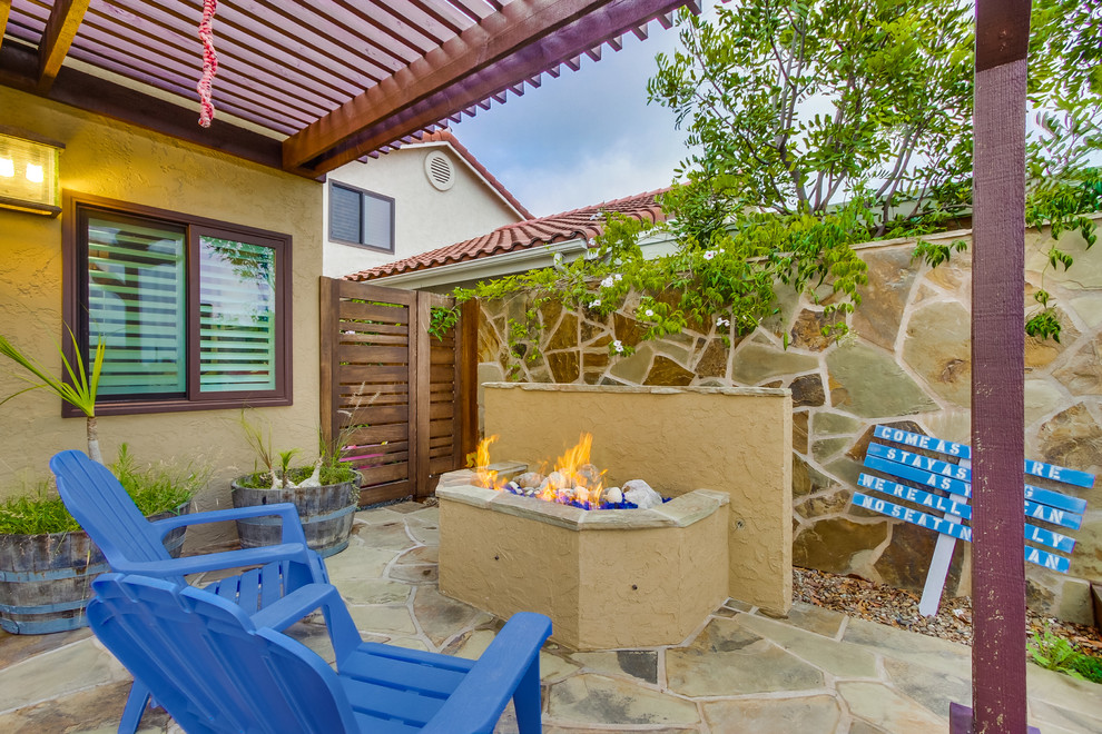 Stone Wall and Fire Pit - Beach Style - Patio - San Diego ...