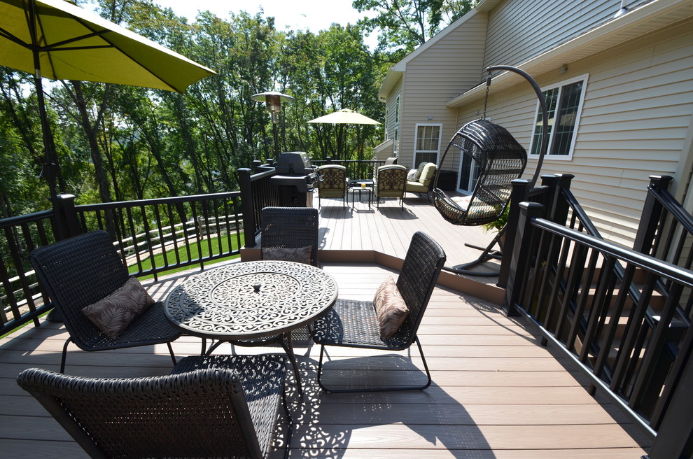 This is an example of a large modern backyard deck in Philadelphia.