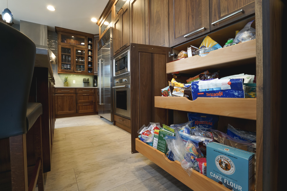 Large transitional kitchen photo in Denver with an undermount sink, recessed-panel cabinets, medium tone wood cabinets and an island