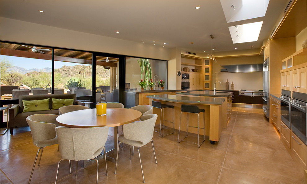 This is an example of a contemporary kitchen in Phoenix with stainless steel appliances.